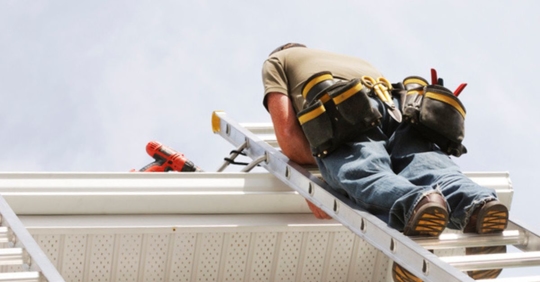 handyman on a ladder