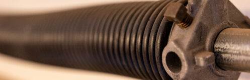 Length-wise perspective of a garage spring