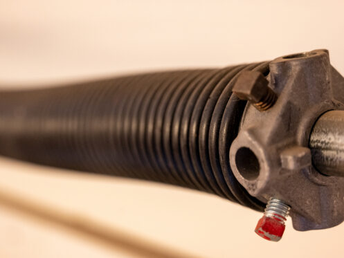 Length-wise perspective of a garage spring